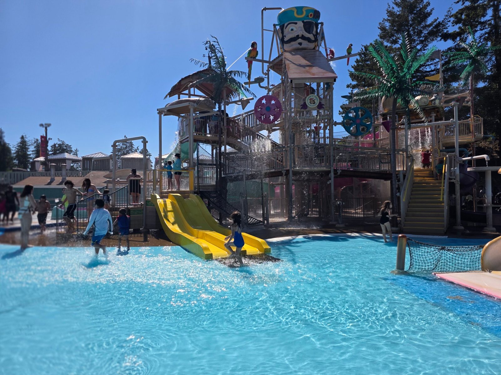 Children playing in the pirate-themed splash zone at Wild Waves