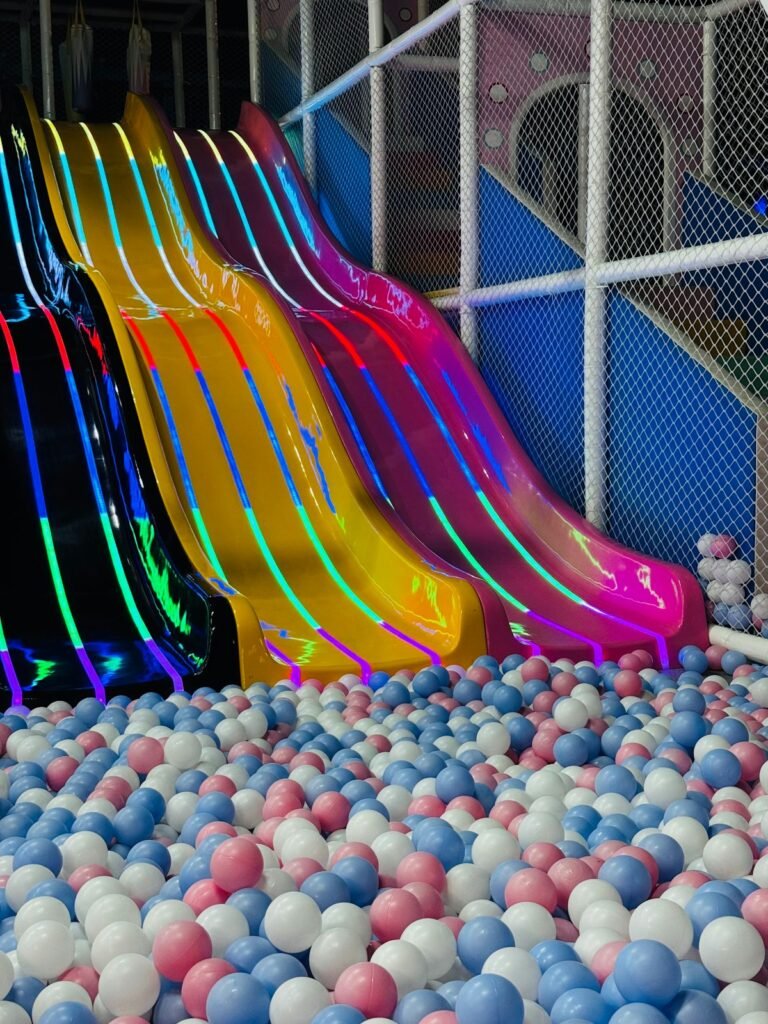Colorful indoor playground slides over a ball pit, a rainy-day favorite for Bremerton toddlers